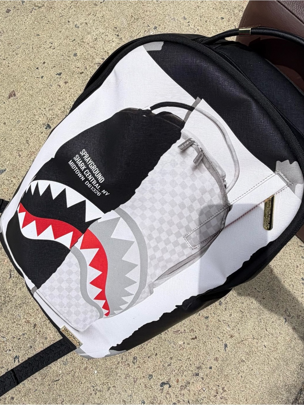 Sprayground Black White and Red Shark Mouth Backpack
